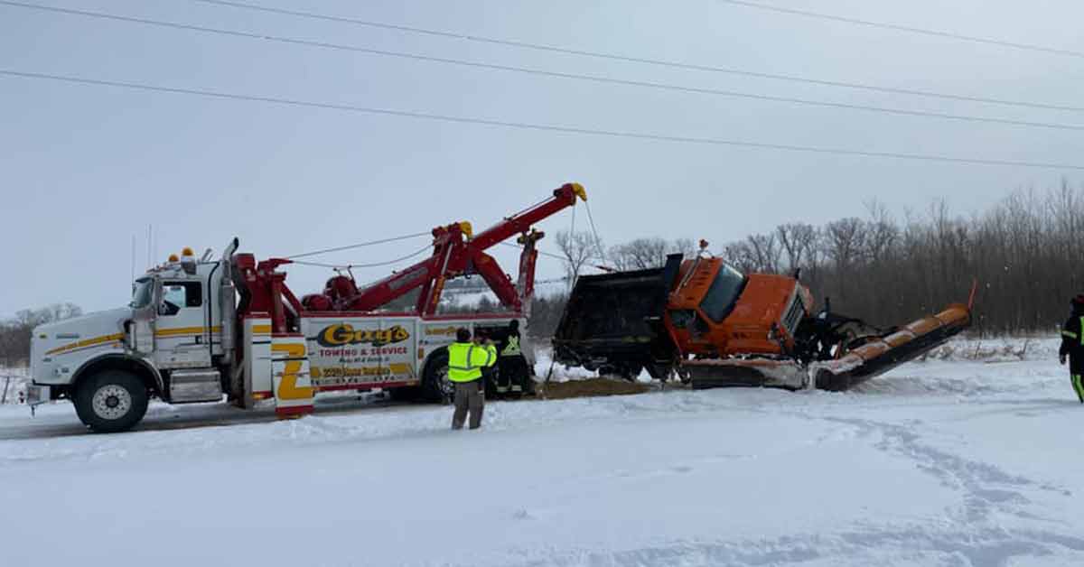 Emergency Tow Truck Zachary Guy's Towing Service